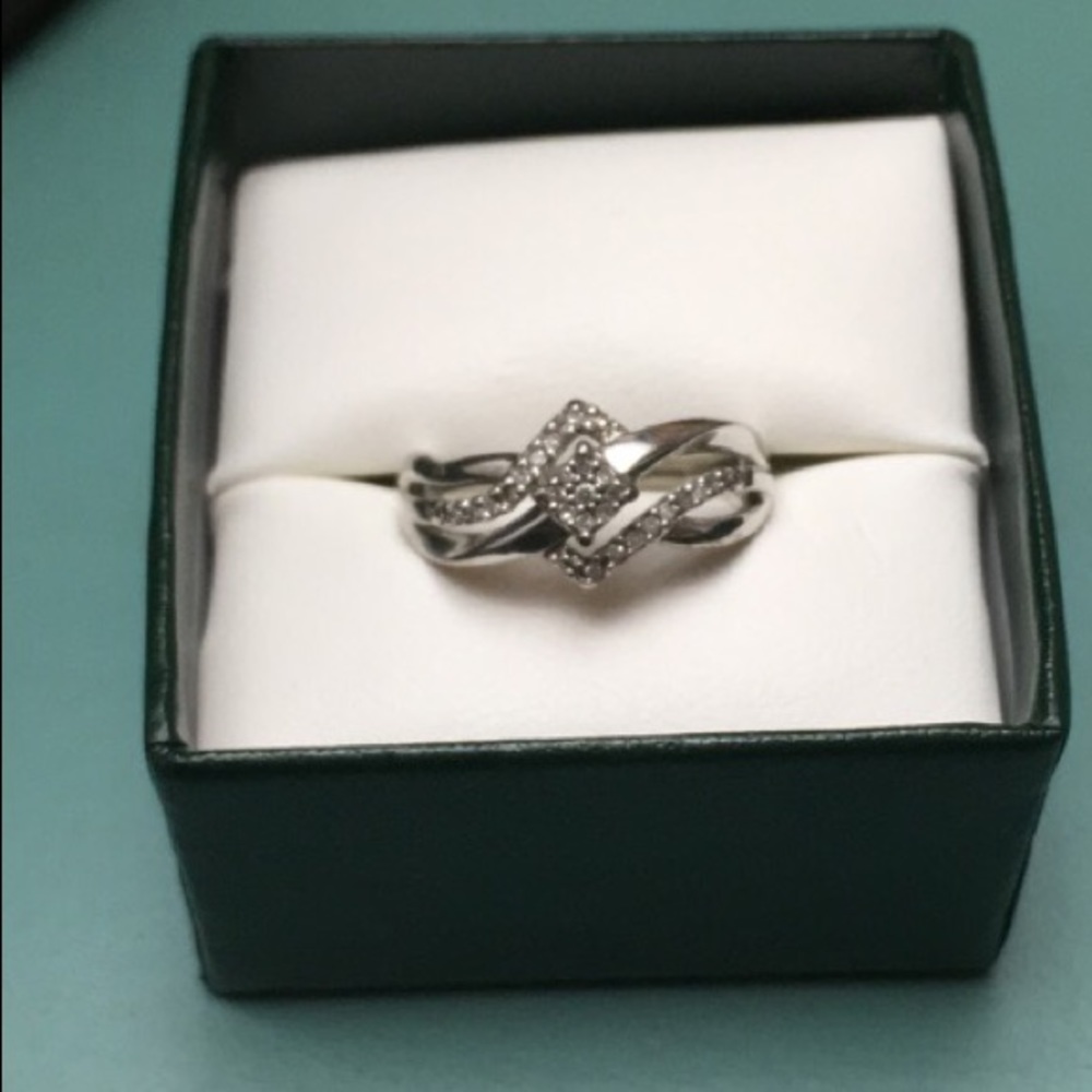 Sterling silver diamond ring.